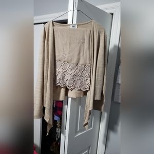 2-piece knit top set. Jacket long sleeved, waist length.